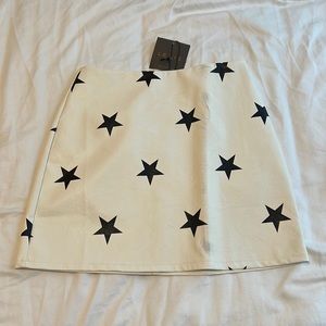 Lelis white leather skirt with stars
